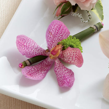 Pink Mokara Boutonniere – C & D FLORAL LTD, Pincher Creek AB